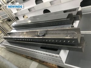 a group of metal pieces on a pallet